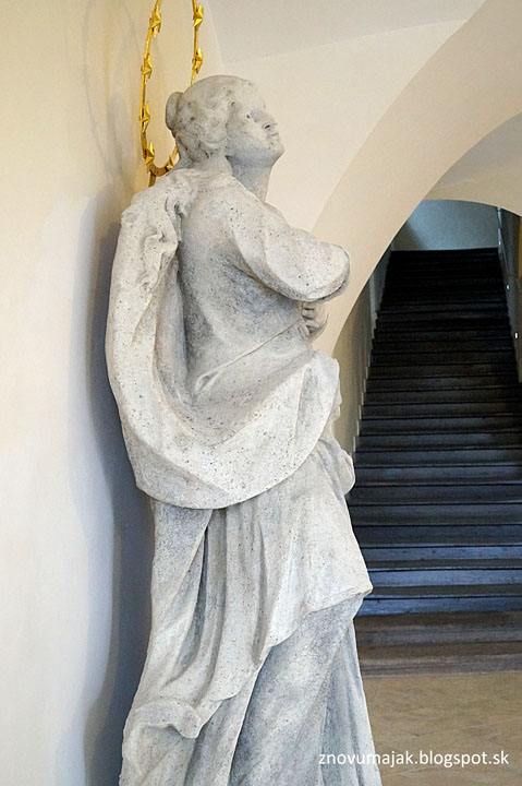 Sculpture of Immaculate Virgin Mary standing on a serpent-wrapped globe in the interior of City Hall, Kremnica